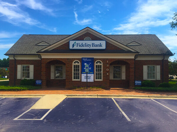 An image of a sunny day at the Sunset Plaza bank