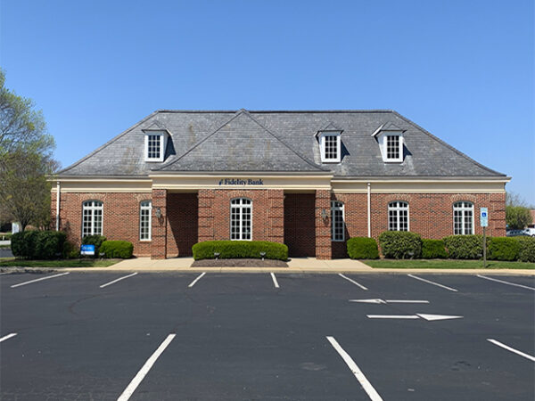 An image of a sunny day at the Mebane bank