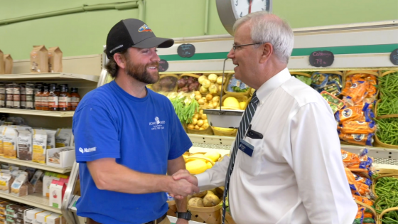 2 men in a supermarket