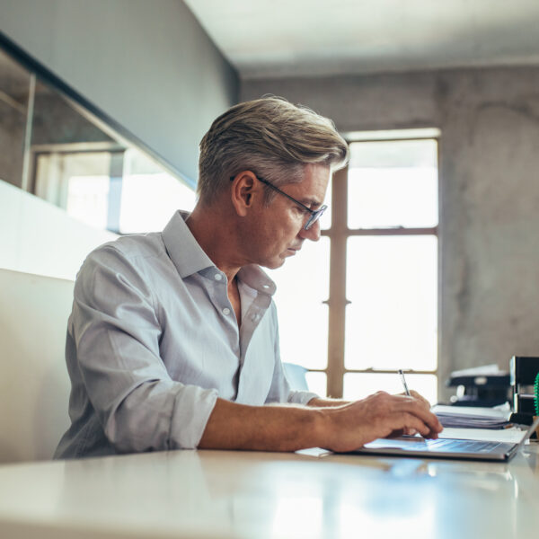 Mature businessman working at his desk.