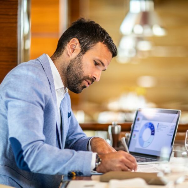 Entrepreneur writing on a document