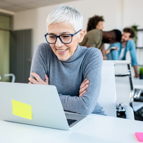 Woman looking at her work laptop