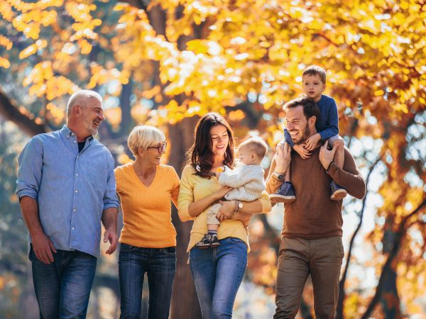 Multigenerational family in autumn park