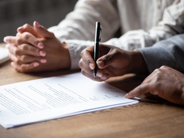 Individual signing a document