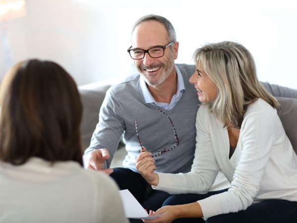 Senior couple meeting financial adviser