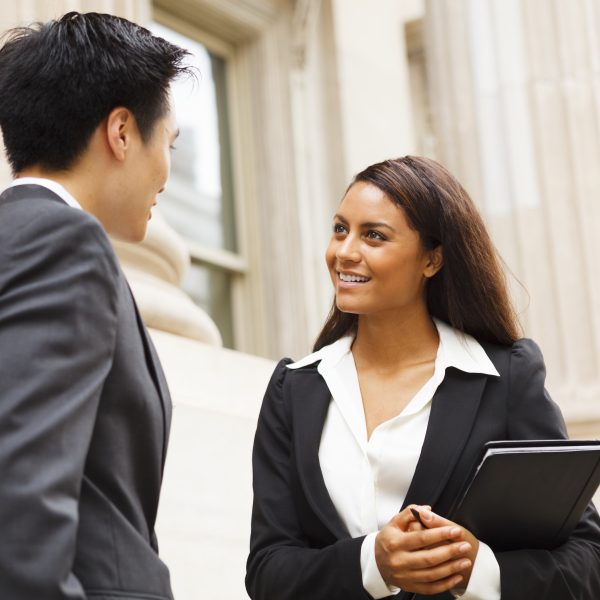 Business women having discussion with business man