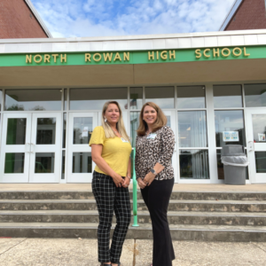 Fidelity associates in front of school