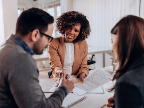 Three people in a meeting