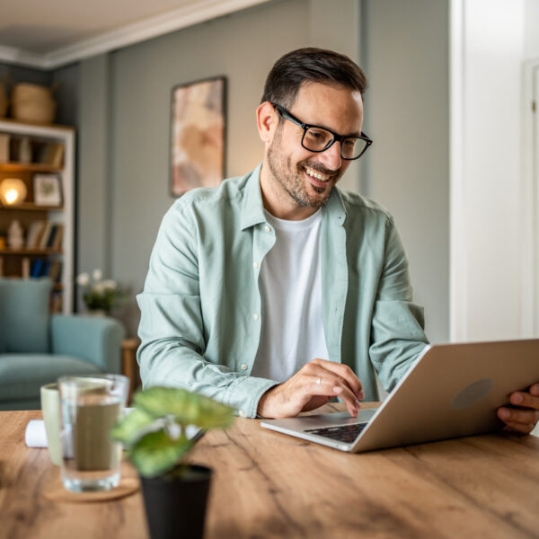 man on laptop at home