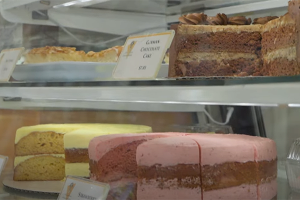 Baked goods behind a case in a bakery