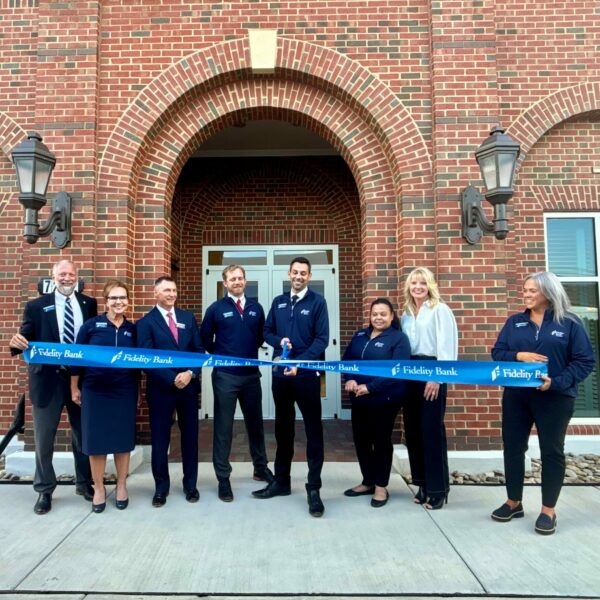 Denver team cutting the ribbon during the Grand Opening and ribbon cutting ceremony on 10/8/2025